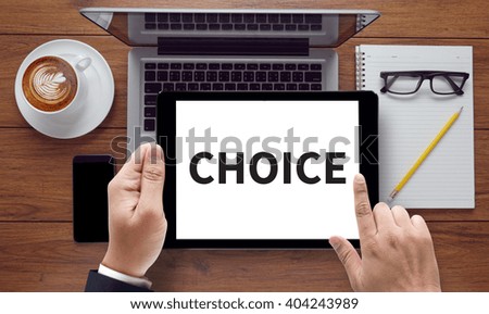 CHOICE , on the tablet pc screen held by businessman hands - online, top view