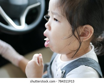 Choking Little Asian Baby Eating A Piece Of Apple