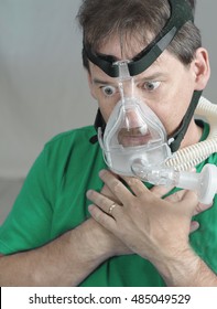 Choking Man In A CPAP Mask