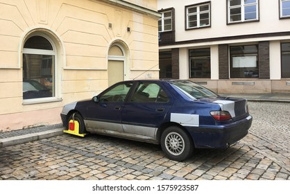 Chomutov, Czech Republic - 03/12/2019: The Czech Police Blocked An Old Car With A Denver Boot