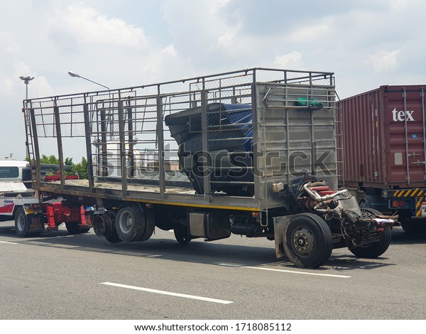 Chon
Buri, Thailand - April 26,2020: An empty trailer has an accident on
the outbound motorway which is preparing to
move.