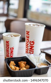 Chon Buri,Thailand/Chon Buri  July 24, 2019 : Deep Fried Chicken With Salt And Sticky Rice Limited Menu In Berger King In Thailand.