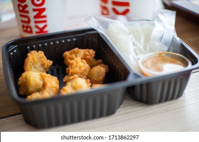 Chon Buri,Thailand/Chon Buri  July 24, 2019 : Deep Fried Chicken With Salt And Sticky Rice Limited Menu In Berger King In Thailand.