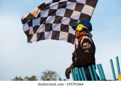 CHONBURI - APRIL 20,2014 : Marshall Waving Checker Flag In Super One Race 2014 On April 20, 2014 At Bira International Circuit, Chonburi, Thailand