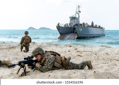 CHONBURI, THAILAND - FEBRUARY 16, 2019: US Marine infantrymen land on target's sea shore during Cobra Gold 2019 Multinational Military Exercise on February 16, 2019 in Chonburi, Thailand.