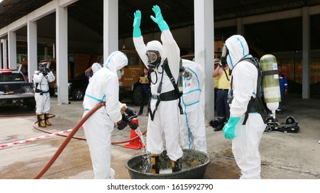 Chonburi/ Thailand - July 10,2019 : Emergency Action Plan & Safety Management Training, Firemen Rescue Team Are Washing After Be Contacting Chemical.