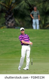 CHONBURI,THAILAND - DECEMBER 15:Simon DYSON of ENGLAND plays a shot during day one of the Thailand Golf Championship at Amata Spring Country Club on December 15, 2011 in Chonburi, Thailand.