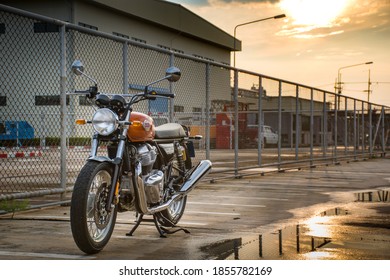 Chonburi/Thailand- September 14,2020: Photography of 2019 Royal Enfield Interceptor 650 cc parked on a country road in a forest while traveling .