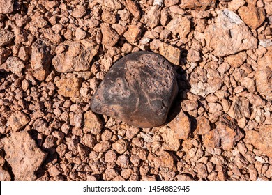 Chondrite Meteorite L Type, A Piece Of Rock Formed In Outer Space In The Early Stages Of Solar System As Asteroids. This Meteorite Comes From A Meteorite Fall Impacting The Earth At Atacama Desert