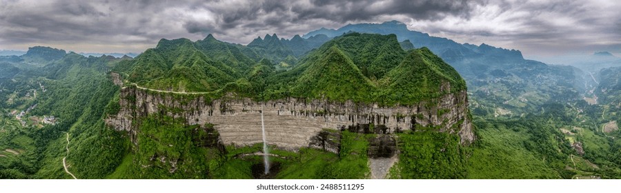 In Chongqing, China, Jinfo Mountain Scenic Area has Pingtaifang Mountain and waterfalls. - Powered by Shutterstock