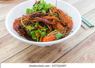 Chongqing Sichuan Spicy Dried Chilli Small Lobsters, With Chopsticks & Spoon. Isolated Food Photography At Chinese Restaurant.