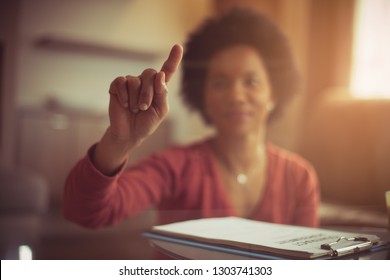  Choose What You Need. Woman Hand Pressing Touch Screen. Focus On Finger. Close Up.