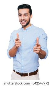 I Choose You! Confident Young Indian Man Pointing You And Smiling While Standing Against White Background