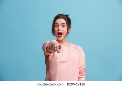 I choose you and order. The smiling business woman point you, want you, half length closeup portrait on blue studio background. The human emotions, facial expression concept. Front view. Trendy colors - Shutterstock ID 1029419128