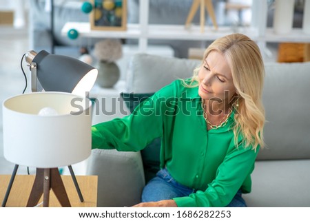 Similar – Image, Stock Photo Girl stiring coffee and looking her tablet