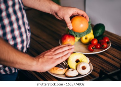 Choosing Healthy Eating. Cropped Portrait Of Overweight Man Eat Healthy Food Refusing Junk Snacks And Sweets. Lifestyle, Weight Loss, Dietary, Healthcare And Medical Concept.