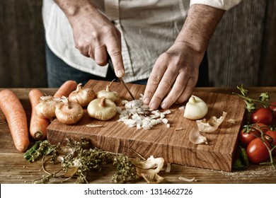 chop onion on wooden chopping board - healthy and traditional eating - desaturated effect - selective focus - closeup - Powered by Shutterstock