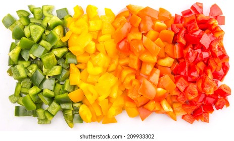 Chopped Colorful Capsicum Over White Background