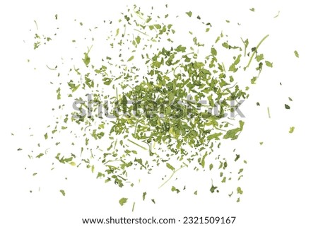 Chopped dry parsley leaves, pile isolated on white background, top view