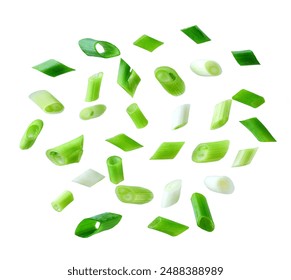 Chopped fresh green onions isolated on a white background. Falling green onion slices, isolated. clipping path.