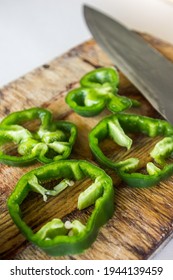 Chopped Green Chili On Wooden Board
