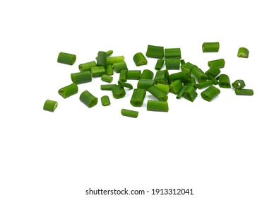 Chopped green onions isolated on white background. Fresh green onion feathers close-up. Chopped chive - Powered by Shutterstock