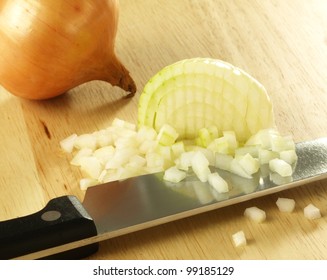 Chopped Onion On Cutting Board