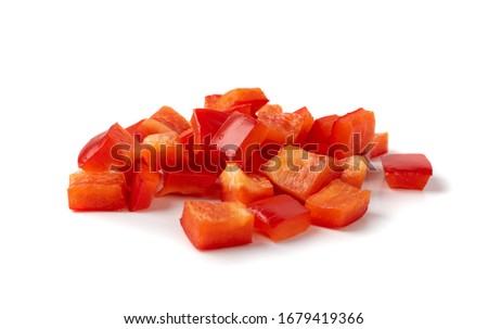 Chopped paprika or red sweet pepper cuts isolated on white background. Diced bell pepper
