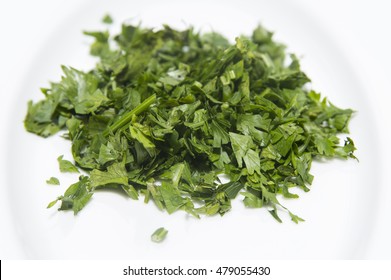 Chopped Parsley On A White Background Isolated