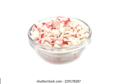 Chopped Pieces Of Crab Meat In A Glass Dish On A White Background