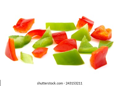 Chopped Red And Green Pepper On White Background