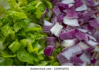 Chopped Romaine Lettuce And Red Onion, Close Up. 