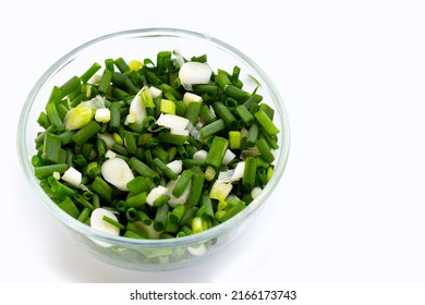 Chopped Spring Onions In Glass Bowl On White Background.