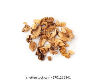 Chopped wallnut , broken roasted walnuts powder, heap of nuts crumbs, whole kernel pieces, fractions, powder top view on white background