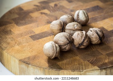 Chopped Walnuts On A Wood Board