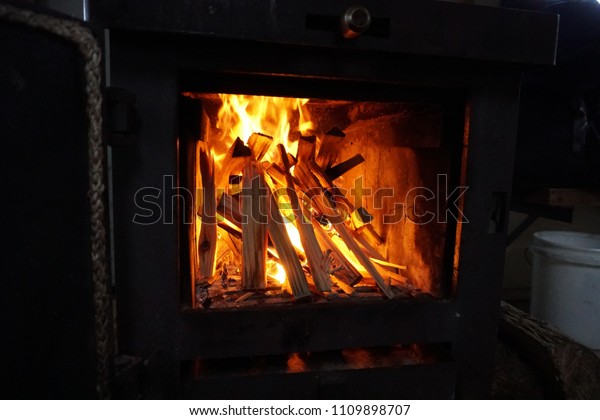 Chopped Wood Burning Flames Stove Stock Photo Edit Now 1109898707