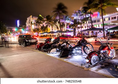 Choppers Parking In Ocean Drive With A Nightclub In The Background, South Beach, Miami