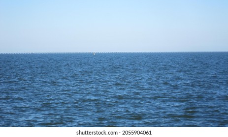 Choppy Waters of Lake Pontchartrain With the 23.83 Mile Causeway On the Horizon