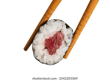 Chopsticks lifting a fresh piece of tuna sushi roll, showcasing the rice, seaweed, and raw tuna filling - Powered by Shutterstock