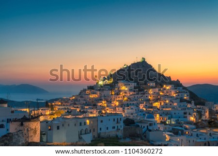 Chora village in Ios island in Greece at sunset.