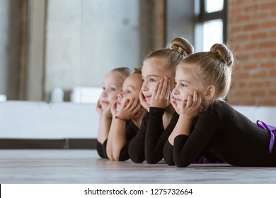 The Choreographer Teaches Children To Dance. Kids Dance Class In Loft Studio With Windows And Sunlight