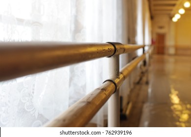 Choreographic machine or barre against the background of the dance ballet class.The handrail in the dance Studio. Interior of an empty dance hall