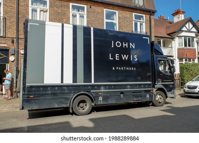 Chorleywood, Hertfordshire, England, UK - June 9th 2021: John Lewis and Partners delivery van. John Lewis and Partners is a brand of high-end department stores operating throughout Great Britain.
