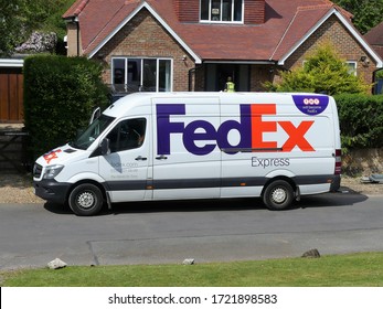 Chorleywood, Hertfordshire, England, UK - May 4th 2020: FedEx Express Mercedes-Benz Sprinter Delivery Van Outside Family House.