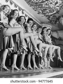 Chorus Line Of Women With Legs Lifted