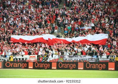 CHORZOW - SEPTEMBER 5: Polish Fans Cheer In Slaski Stadium During The 2010 FIFA World Cup Qualification Match Between Poland And Northern Ireland On September 5, 2009 In Chorzow, Poland.