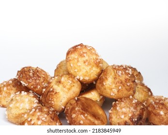  Chouquettes coated with pearl sugar on white background