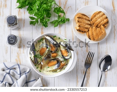 Similar – Image, Stock Photo Creamy mussels on wooden background