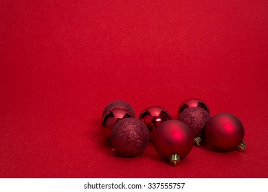 Chrismas Ball For Decorations On Red Blur Background
