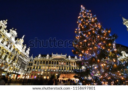 Chrismas Tree decorated with colorful lighting at Grand Place Brussel.